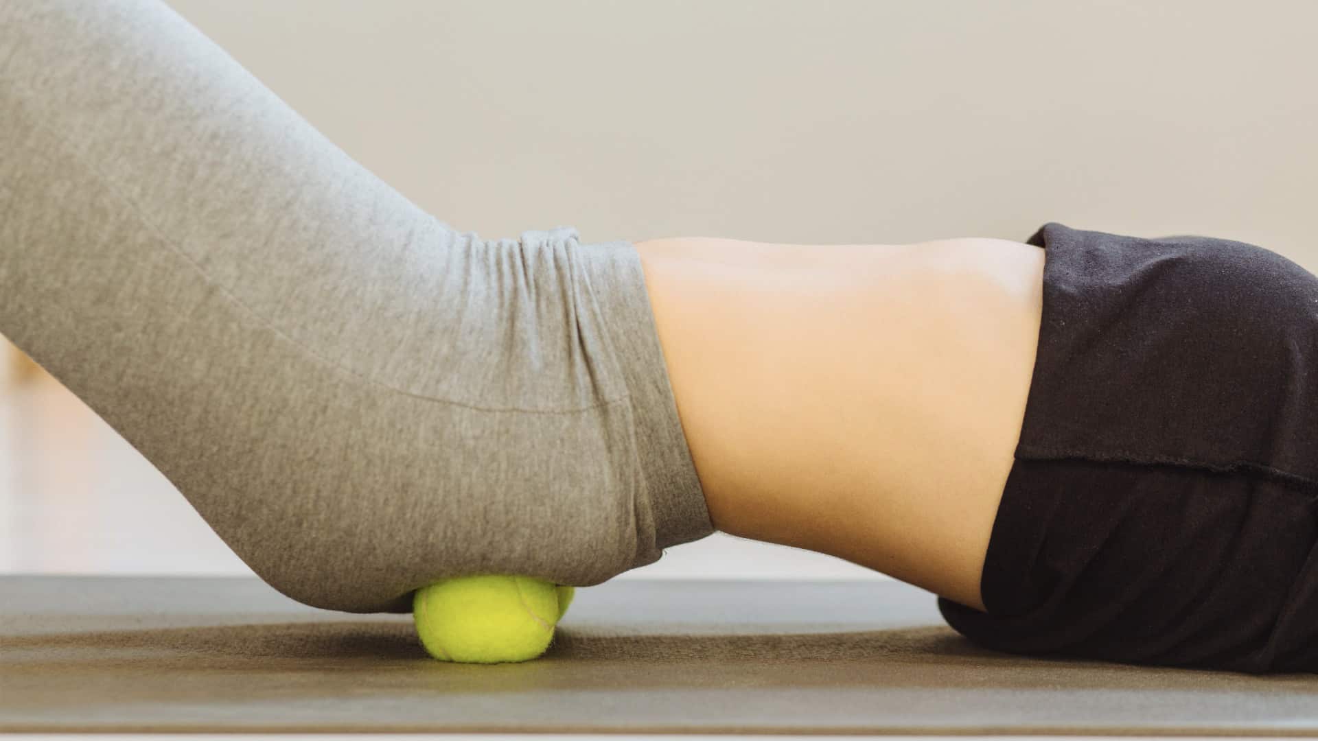 https://www.northeastspineandsports.com/wp-content/uploads/2021/09/How-to-Treat-Sciatica-5-Effective-Home-Exercises-The-Tennis-Ball-Trick-IMG2.jpg